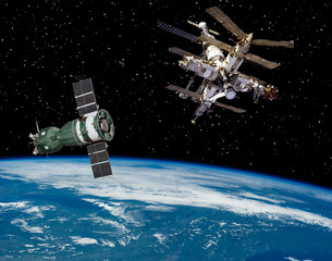 Earth space station and space craft or satellite. The elements of this image furnished by NASA.