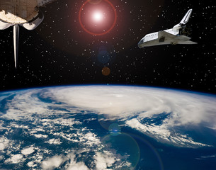Shuttle flies in space. Other spaceship goes anywhere.  The elements of this image furnished by...