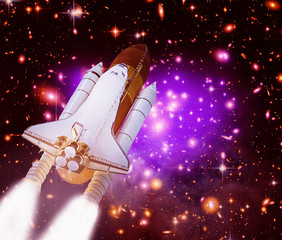 Big rocket (shuttle) lift off to stars and galaxies. The elements of this image furnished by NASA.