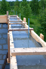 Foundation site of new house, building, details and reinforcements with steel bars