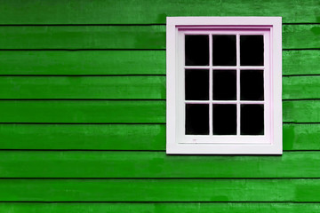 Multi pane colourful wall with white window