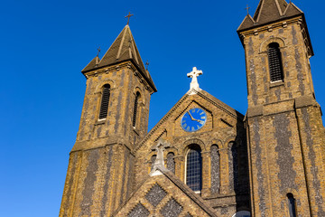 Fototapeta na wymiar LONDON, UK – Oct 21, 2018: St John the Evangelist a neo norman church at Harrow Road Kensal Green London - England, UK