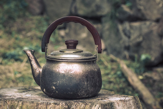 Vintage large aluminum tea pot kettle stove top isolated