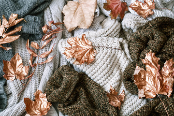 Cozy autumn morning breakfast in bed still life scene. Steaming cup of hot coffee, tea standing near window. Fall.