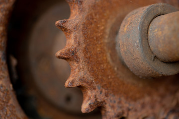Close up shot of a rusty grungy machinery sprocket piece
