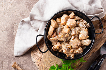 Stewed chicken fillet with mushrooms