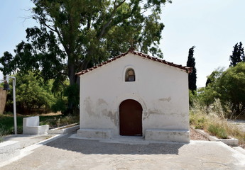 Fototapeta na wymiar old Greek church in a field