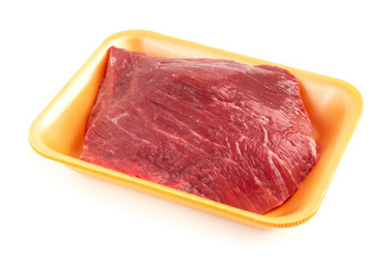 Raw beef  with plastic tray isolated on white background.