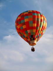 Hot Air Balloon Aloft in a Blue Sky