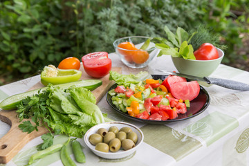 Vegetables ingredients and lettuce leaves for healthy eating and cooking salad
