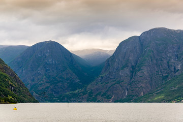 Scenic view of the fjord and rocks in the summer.