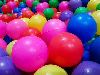 Close-up of  colored plastic balls in pool of game room