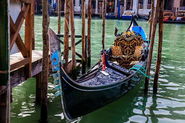 Beautiful traditional gondola at Venice canals
