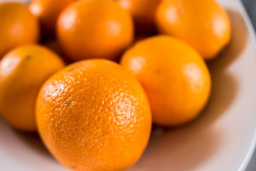 pile of oranges for sale at a farmers market