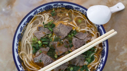 Beef Noodle Soup (La Mien) Chinese noodles cooked with gravy. The noodle is pulled when making it 
