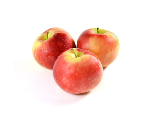 Three red apples isolated on white background. 
