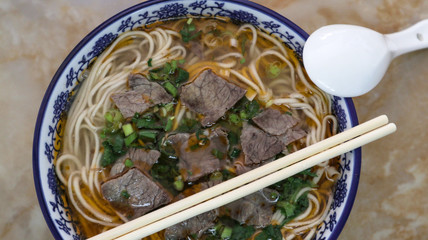 Beef Noodle Soup (La Mien) Chinese noodles cooked with gravy. The noodle is pulled when making it 