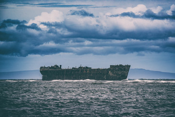Shipwreck Beach in Lanai island, Hawaii, USA travel. Old ship wreck in the ocean.