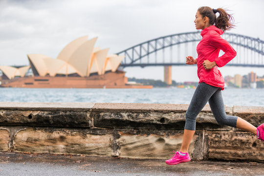 Runner Fit Active Lifestyle Woman Jogging On Sydney Harbour By The Opera House Famous Tourist Attraction Landmark. City Life.