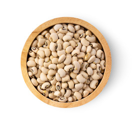 beans in wood bowl islated on white background. top view