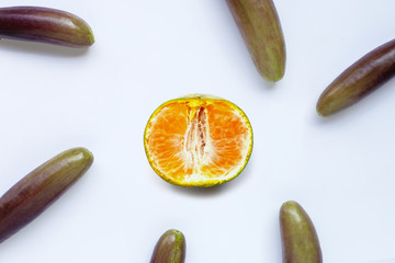Orange with eggplants on white background.  Sex concept