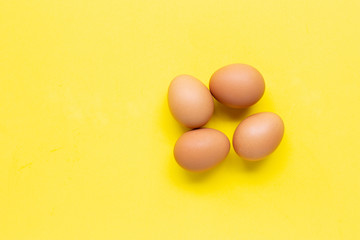 Eggs on yellow background.