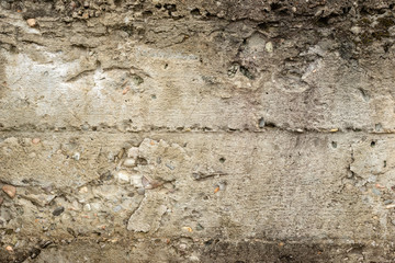 Texture, wall, concrete, it can be used as a background. Wall fragment with scratches and cracks