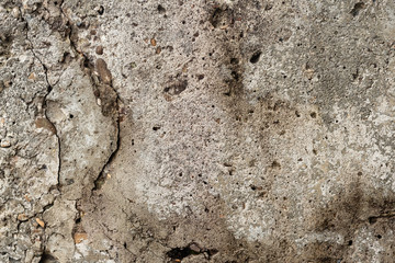 Texture, wall, concrete, it can be used as a background. Wall fragment with scratches and cracks