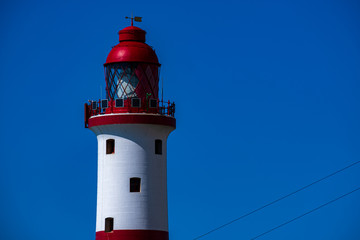 Fototapeta na wymiar Beachy Head Lighthousew with deep blue sky