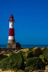 Fototapeta na wymiar Beachy Head Lighthousew with deep blue sky