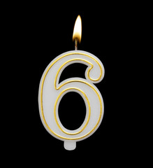 Burning birthday candle isolated on black background, number 6