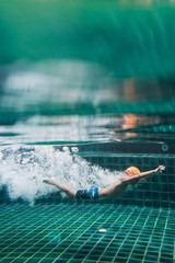 young boy in swimming pool