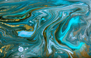 Bronze, blue and gold marbling pattern. Golden marble liquid texture.