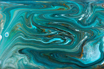 Bronze, blue and gold marbling pattern. Golden marble liquid texture.