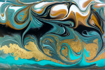 Bronze, blue and gold marbling pattern. Golden marble liquid texture.