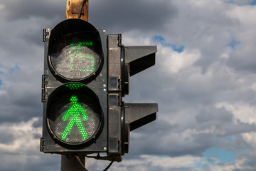 Green light at traffic lights for pedestrians. 15 seconds left.