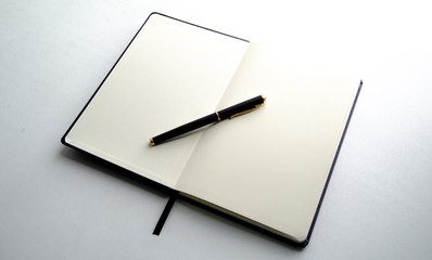 Notebook and an inkpen for business