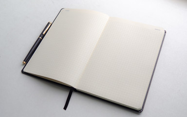 Notebook and an inkpen for business