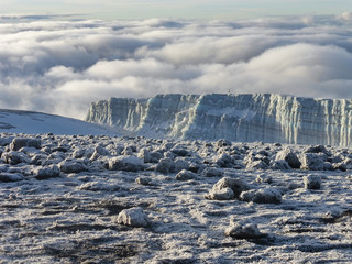 glacier remains and snow covered summit of Mount Kilimanjaro in Tanzania