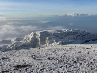glacier remains and snow covered summit of Mount Kilimanjaro in Tanzania