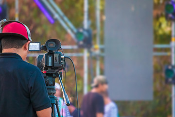 Photographer preparing to work on the concert stage