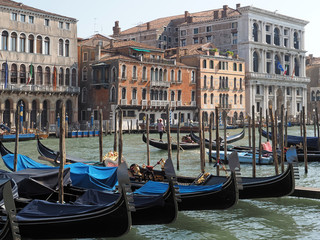 Fototapeta na wymiar Gondolas on grand canal in Venice