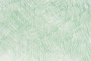 green crayon doodles on paper background texture