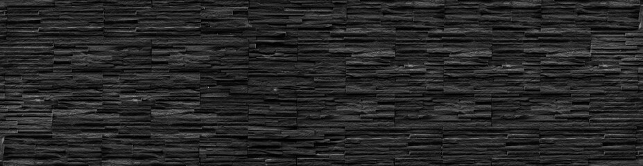 panorama black brick wall of dark stone texture and background