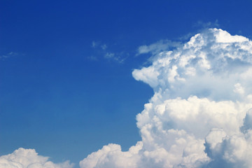 Naklejka na ściany i meble Landscape of cumulonimbus clouds floating in sunny summer sky