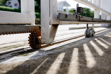 Sliding door casters and concrete floor outside house ,with lighting and shadow.
