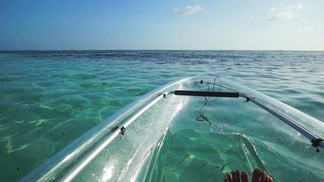 Panning Tilting: Riding a Clear Kayak on the Waters of La Digue Seychelles