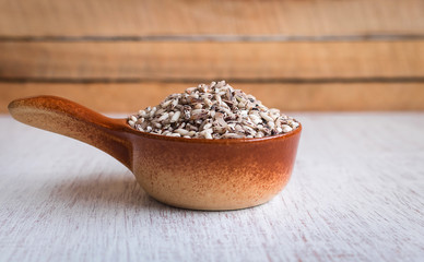 Organic black sticky rice in small ceramic cup.