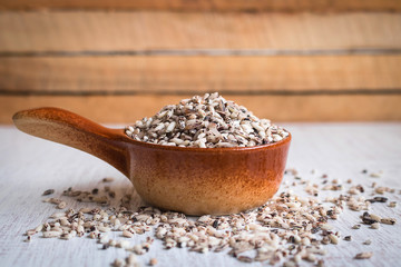 Organic black sticky rice in small ceramic cup.