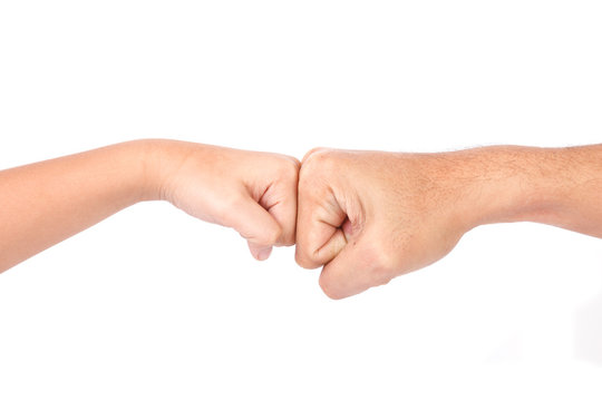 Fist Bump between Man and Boy. ISOLATED On WHITE BACKGROUND.
